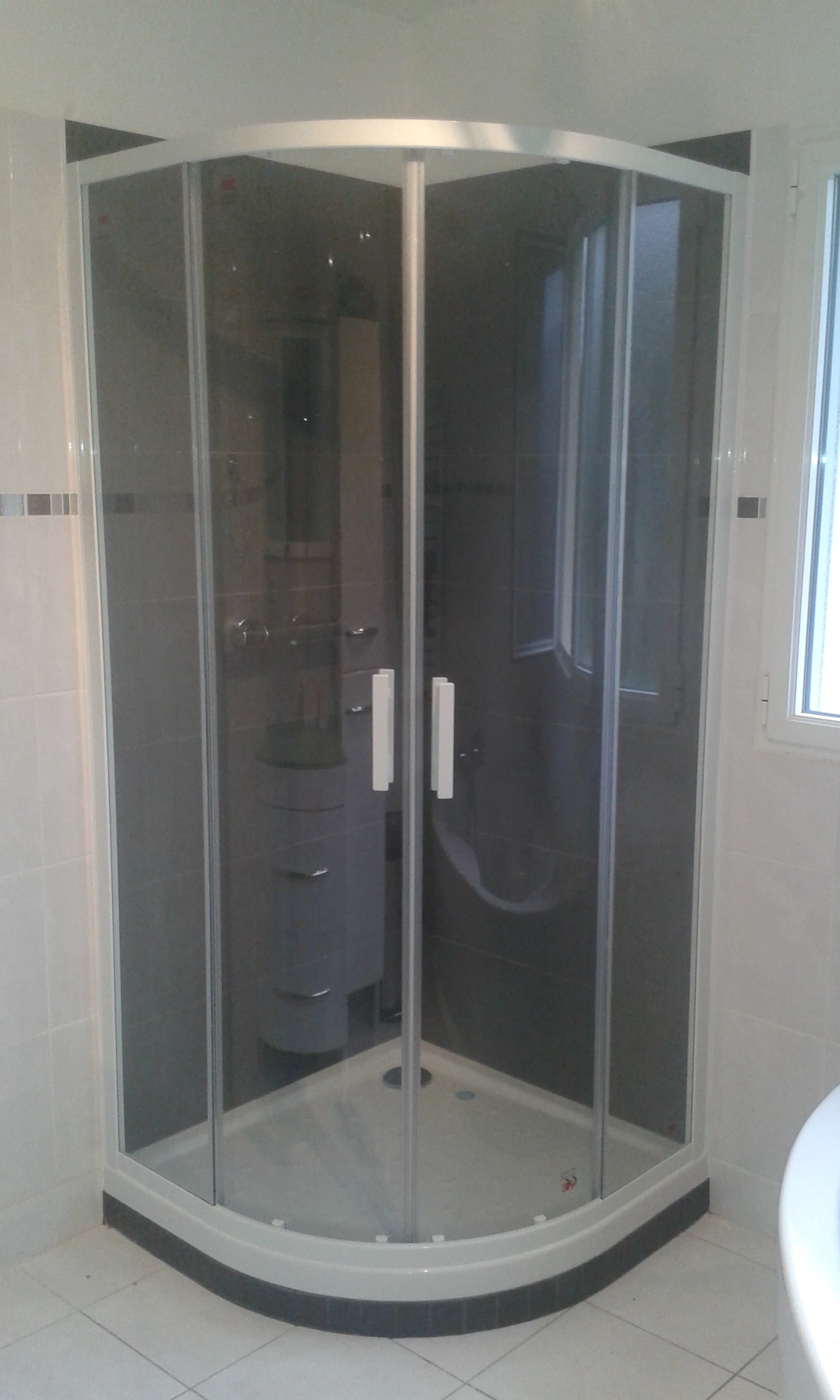 Douche quart de rond